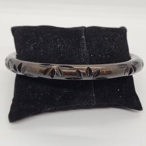 dark brown carved acrylic bangle